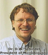 A photograph of Dr. David W. Schindel, founder and president of MicroAcoustic. 