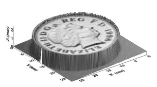 An ultrasonic "photograph" of the back-side of an English pound coin with time-of-flight information being used to additionally provide a true representation of surface relief. This image was acquired in air using a focussed BAT-3 transducer.